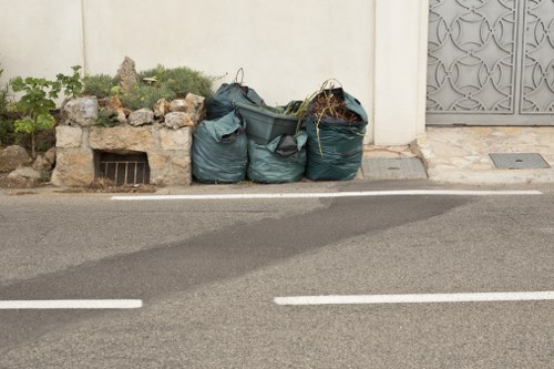 Rubbish removal truck in Narraweena